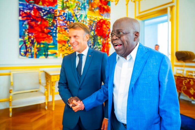 Tinubu in a warm exchange with Macron at the Elysee Palace in Paris. 2 768x512